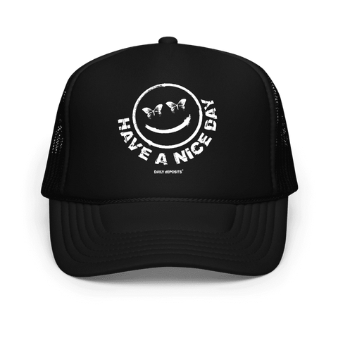 Black trucker hat with white graphic and text on a white background